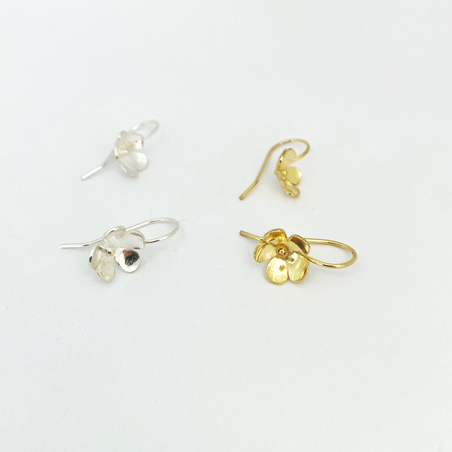 Flower drop earring in silver and gold by designer Savage Jewellery