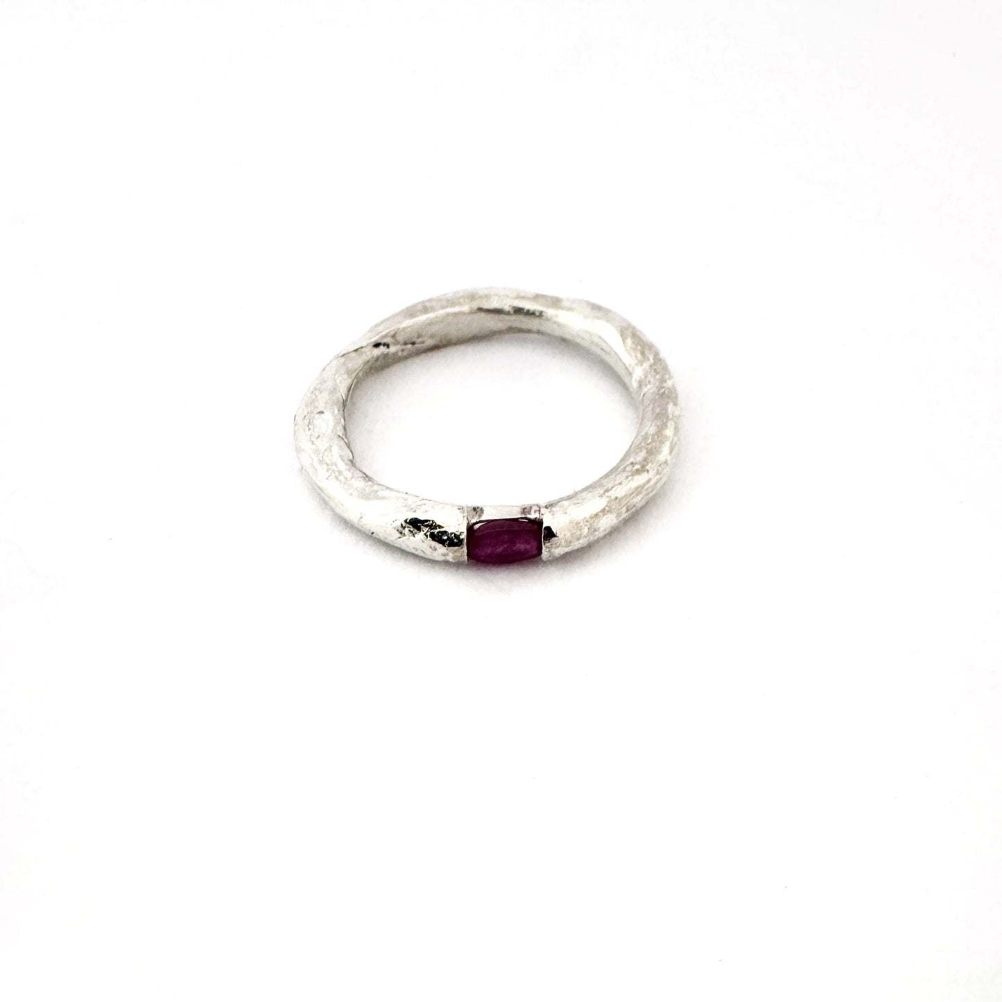 Organic silver ring with floating ruby by contemporary jeweller Savage Jewllery
