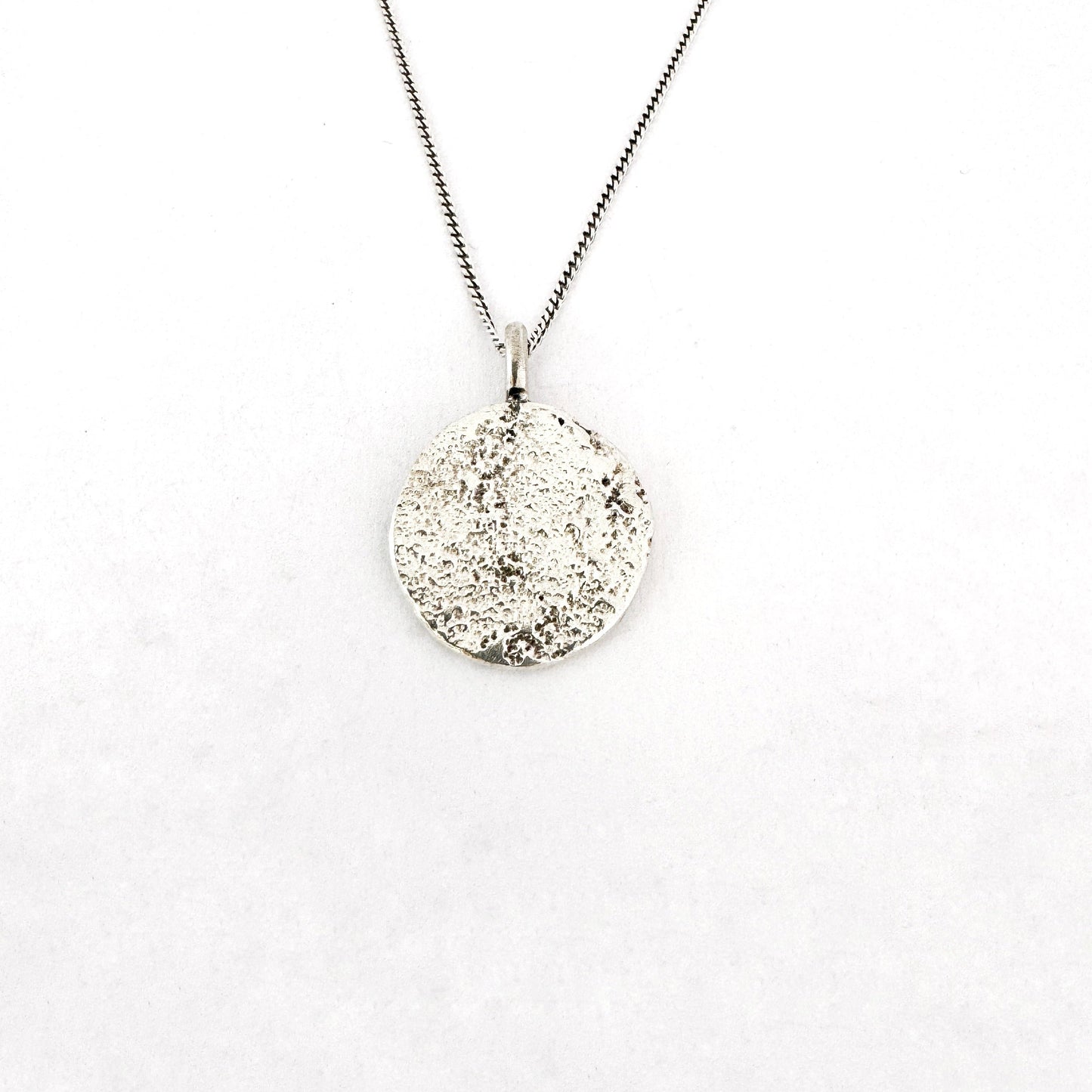 handmade sterling silver textured moon pendant on chain