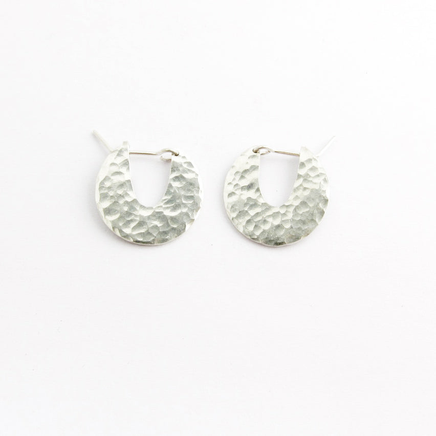 Beaten silver disks, small by Savage Jewellery