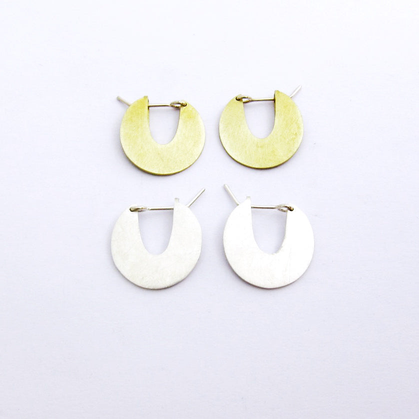 Small disk earrings in brass and silver by Savage Jewellery