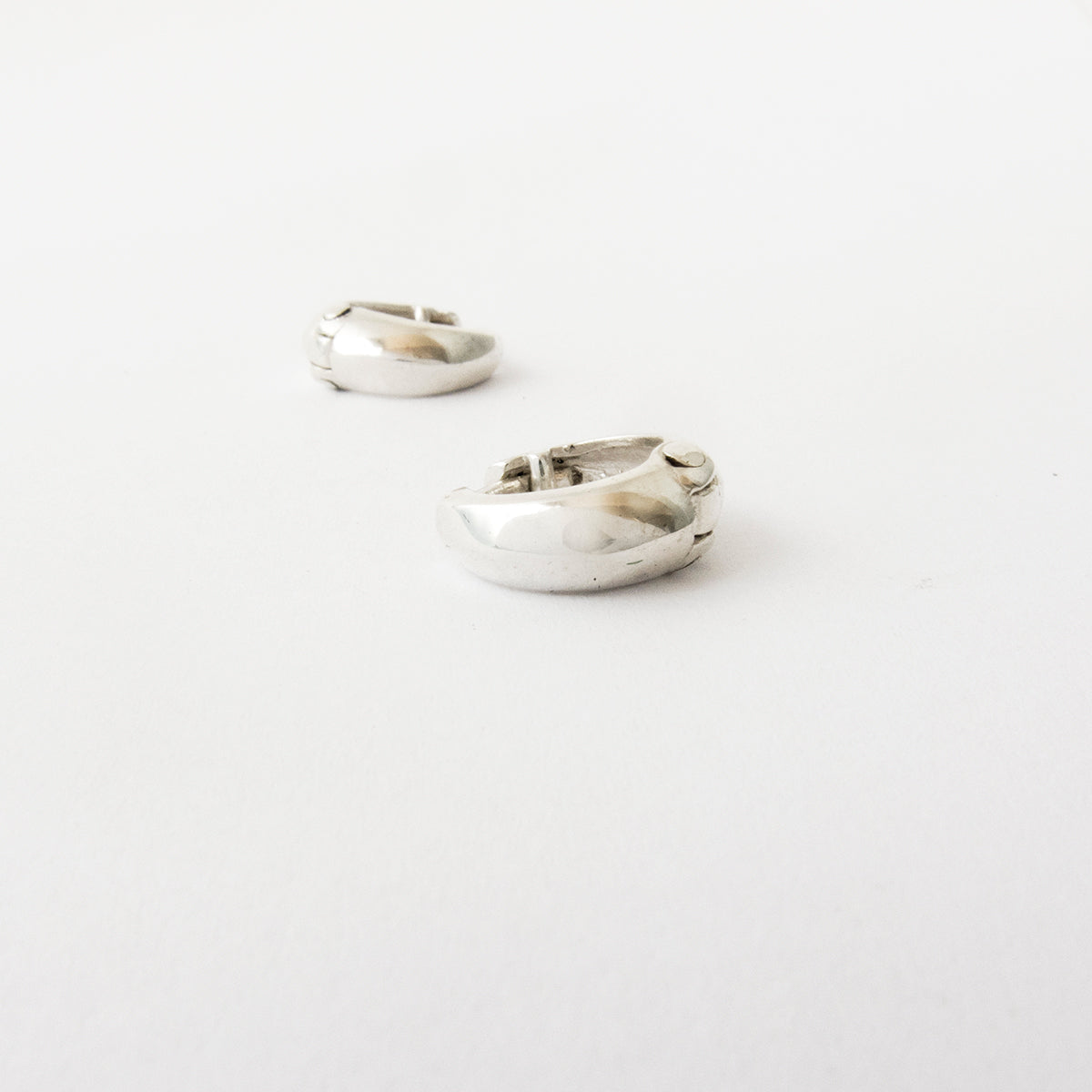 Round huggies - small hoops by Savage Jewellery