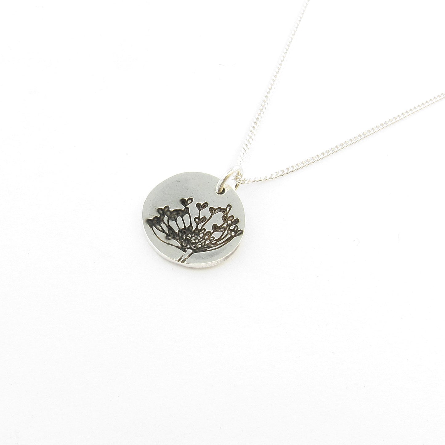 Pincushion protea disk on chain this is part of the Icon Africa range designed in Durban South Africa by Savage Jewellery