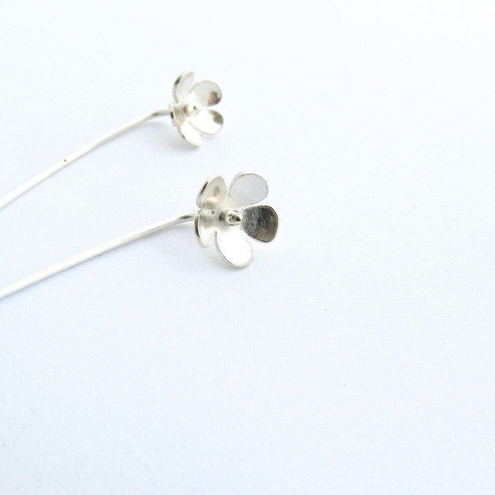 Flower on a stick earring by Savage Jewellery