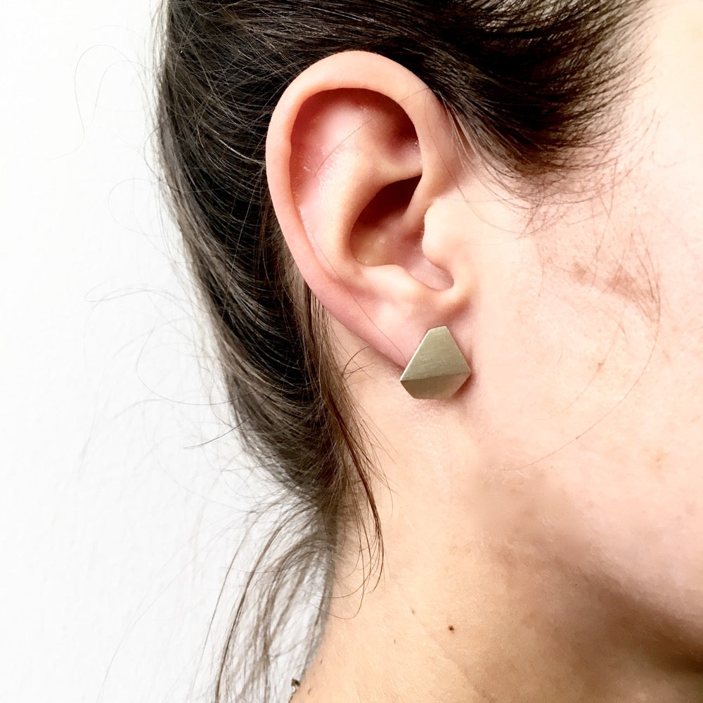 Folded geometric shape drop stud