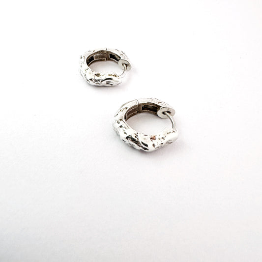 Sterling silver huggies with an organic texture