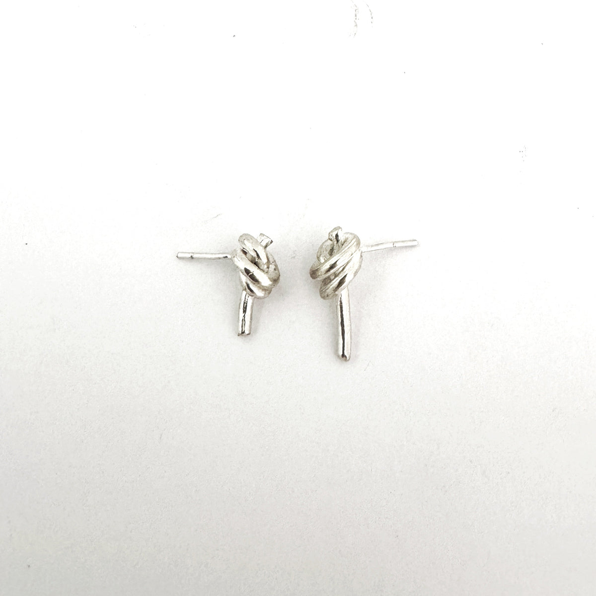 Double Knot stud earrings in sterling silver