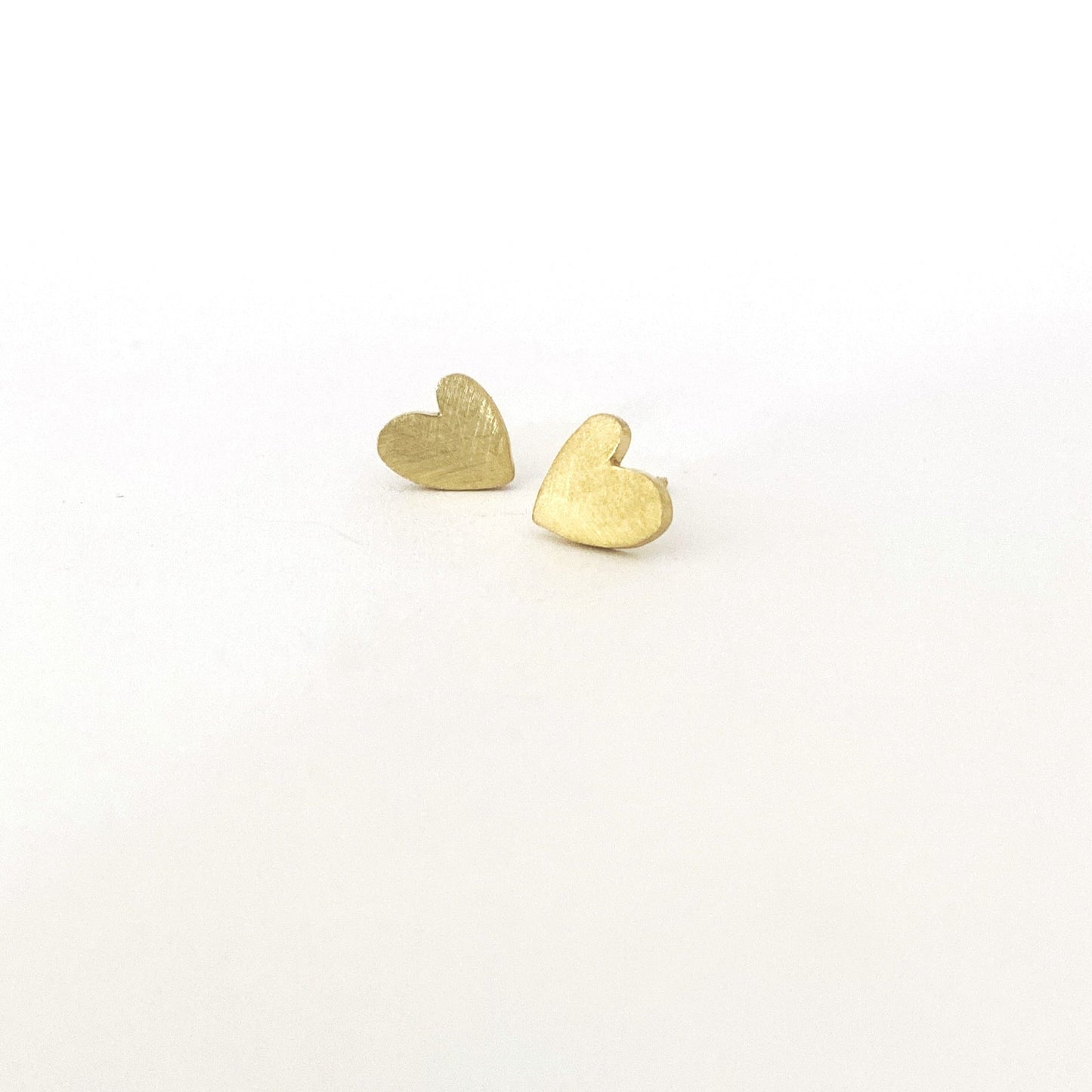 Matt gold heart studs made in Durban 