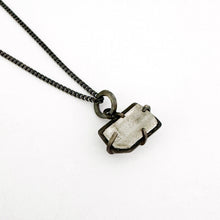 Quartz crystal pendant with oxidised silver by contemporary jeweller Savage Jewellery