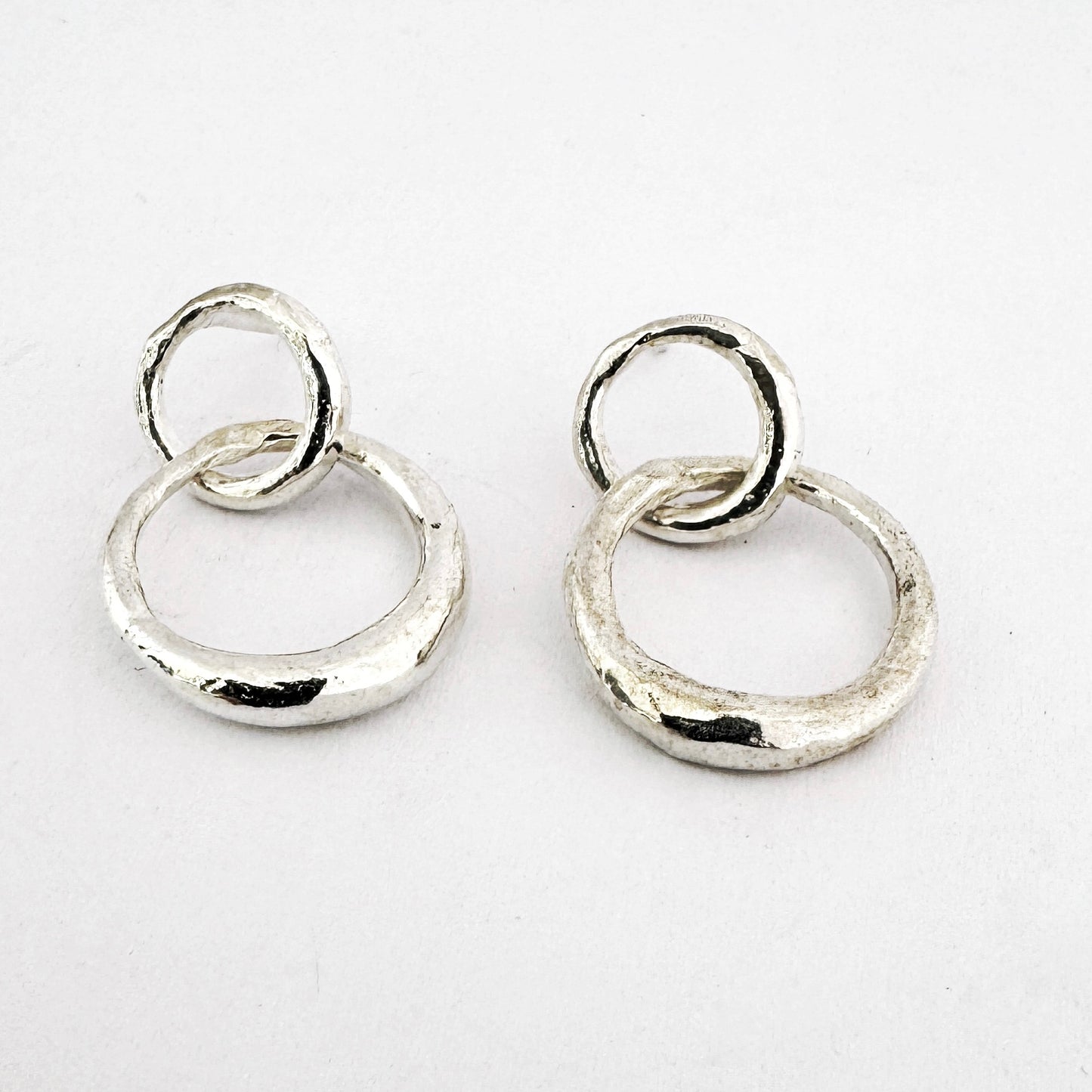 Sterling silver interlinked organic earrings by contemporary South African jeweller Savage Jewellery