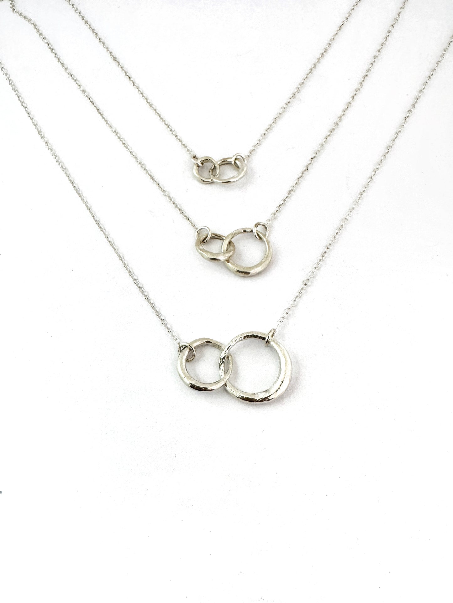 Double interlinked circle necklace in silver