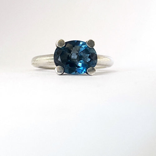 Four claw ring with oval London blue topaz by Durban designer Savage Jewellery