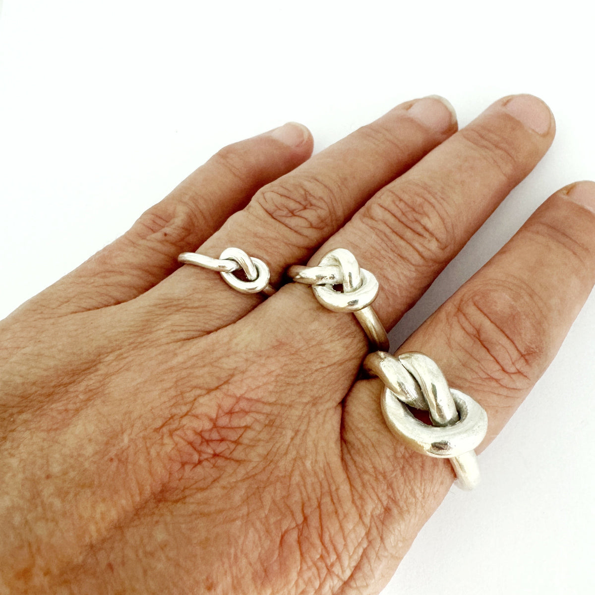 Love Knot Ring in sterling silver, shown in three wire thicknesses