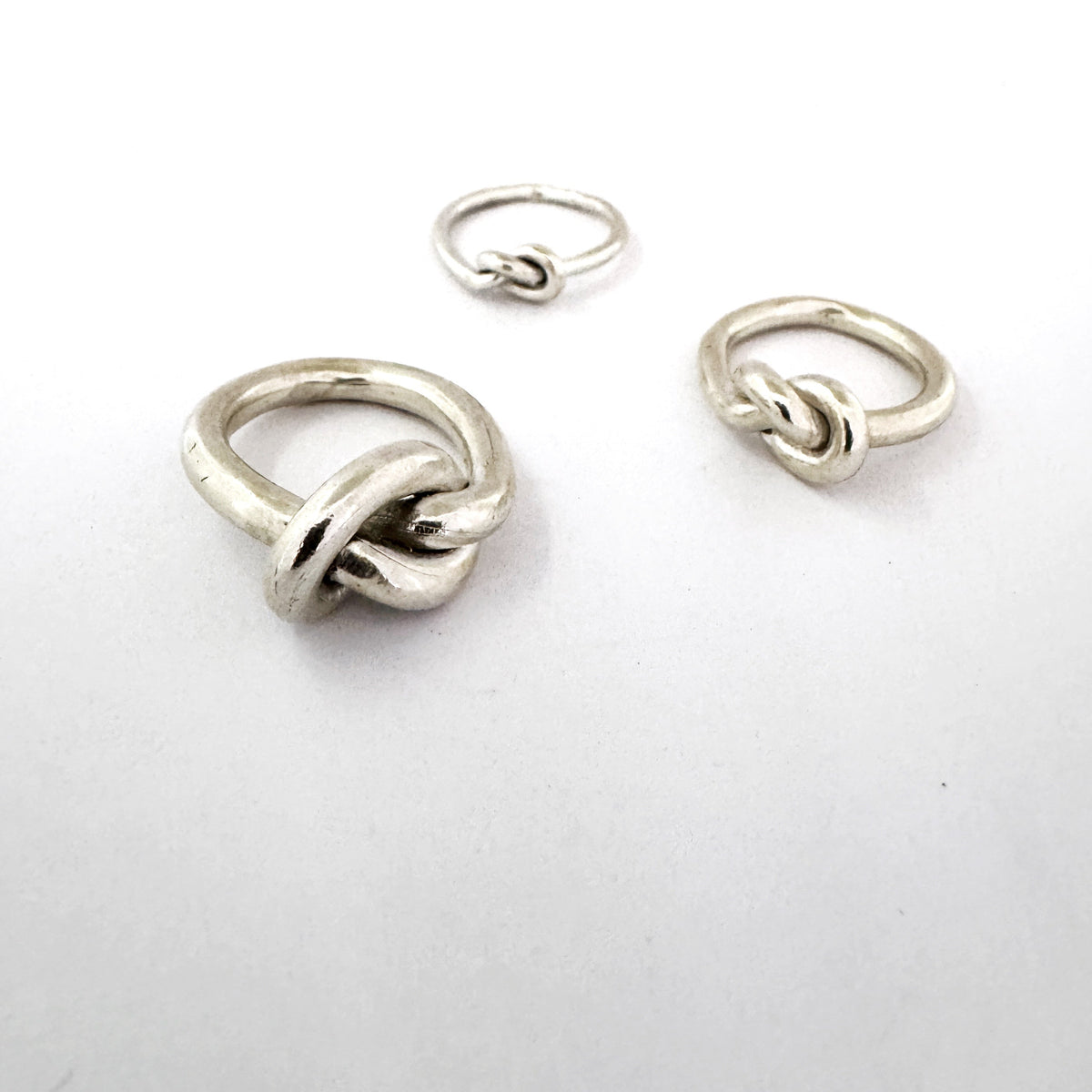 Love Knot ring is sterling silver - three different thicknesses of wire knot rings