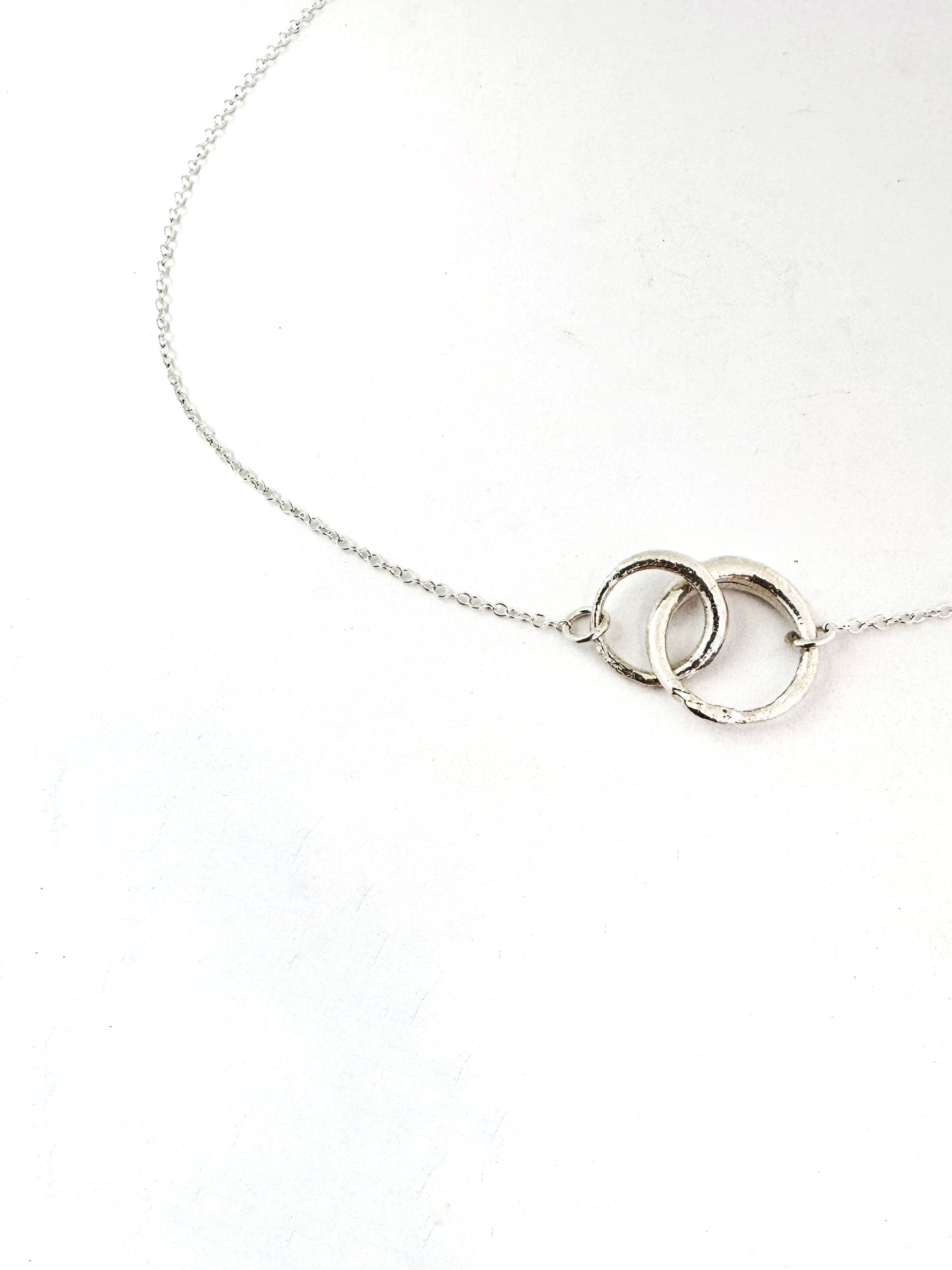 Double interlinked circle necklace in silver
