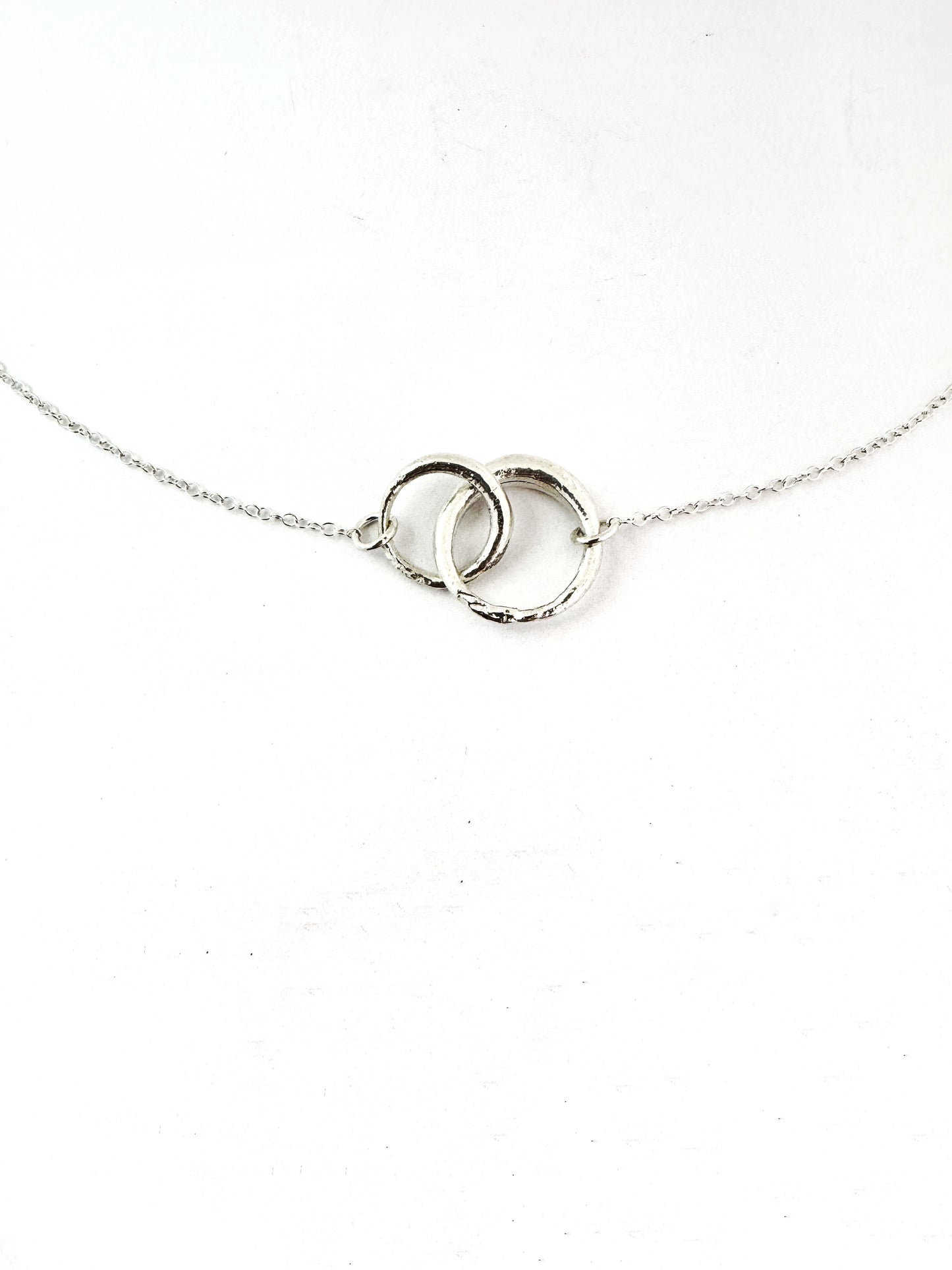 Double interlinked circle necklace in silver