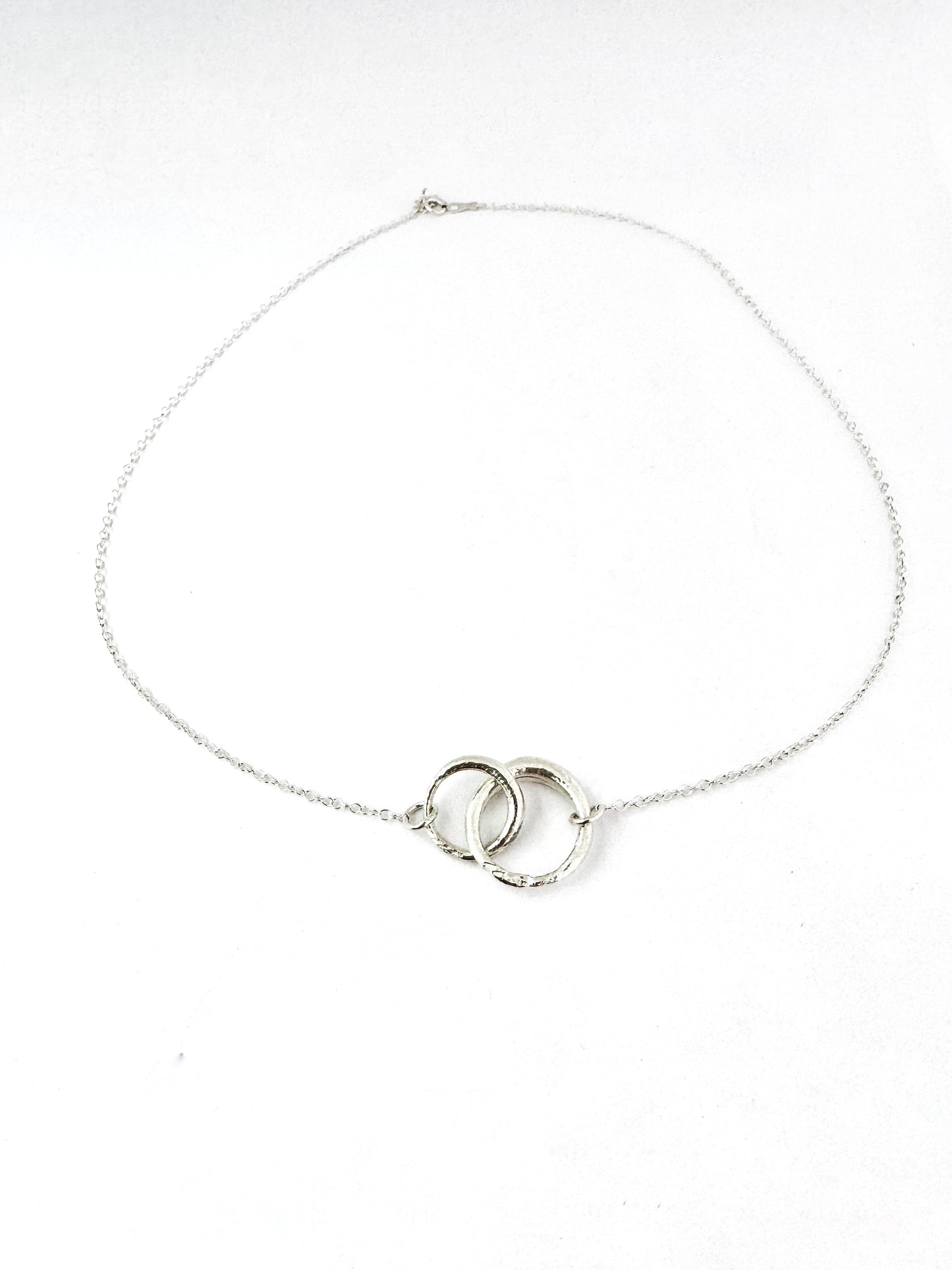 Double interlinked circle necklace in silver