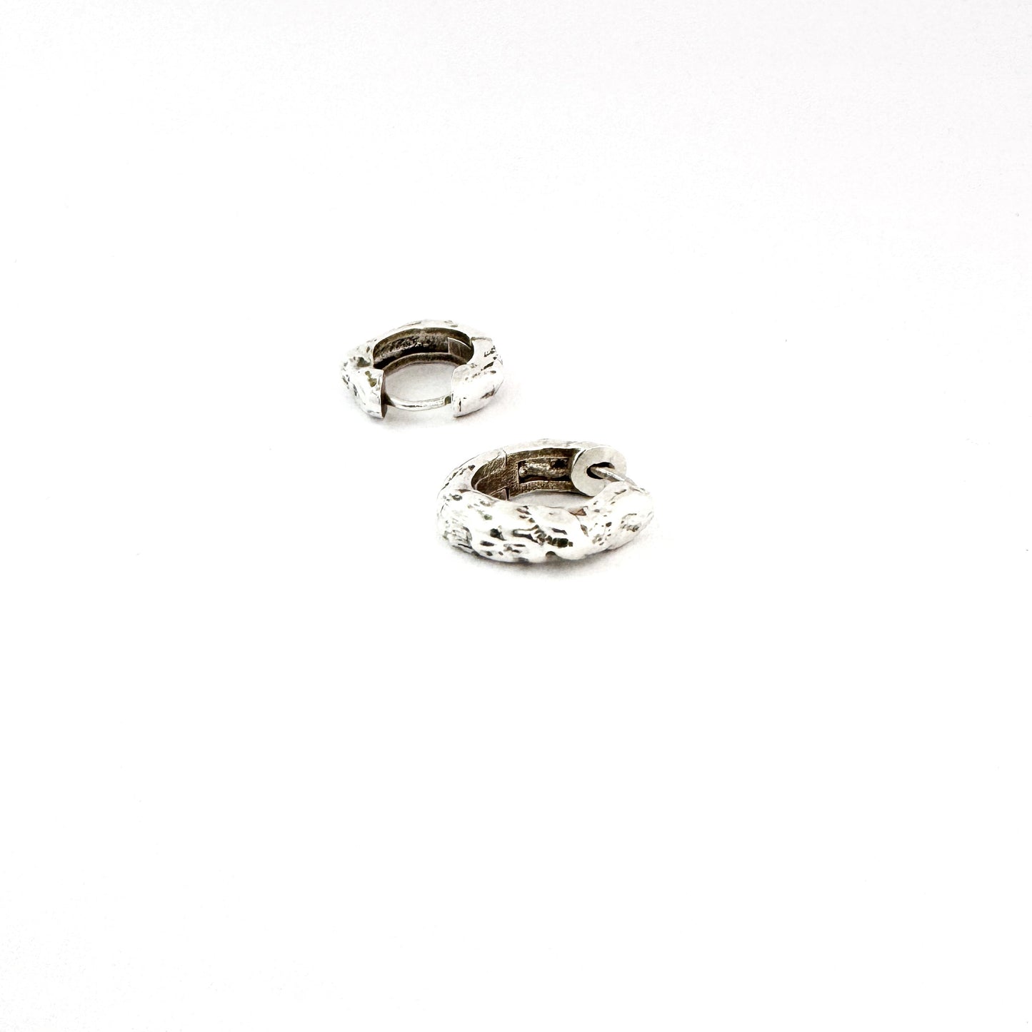 Sterling silver organic huggie earrings by Savage Jewellery
