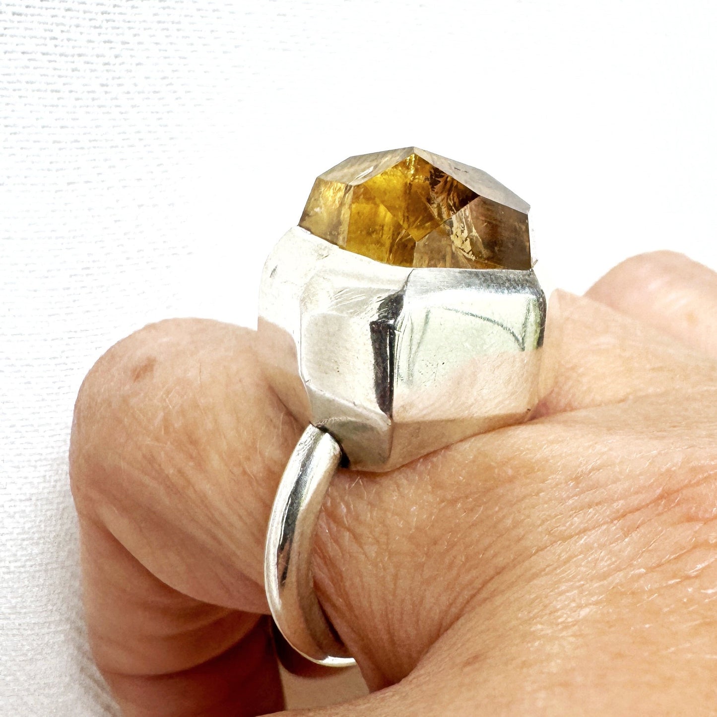 Architectural style ring with custom cut citrine set in a chunky but modern silver ring - the perfect statement ring by contemporary South African designer Savage Jewellery