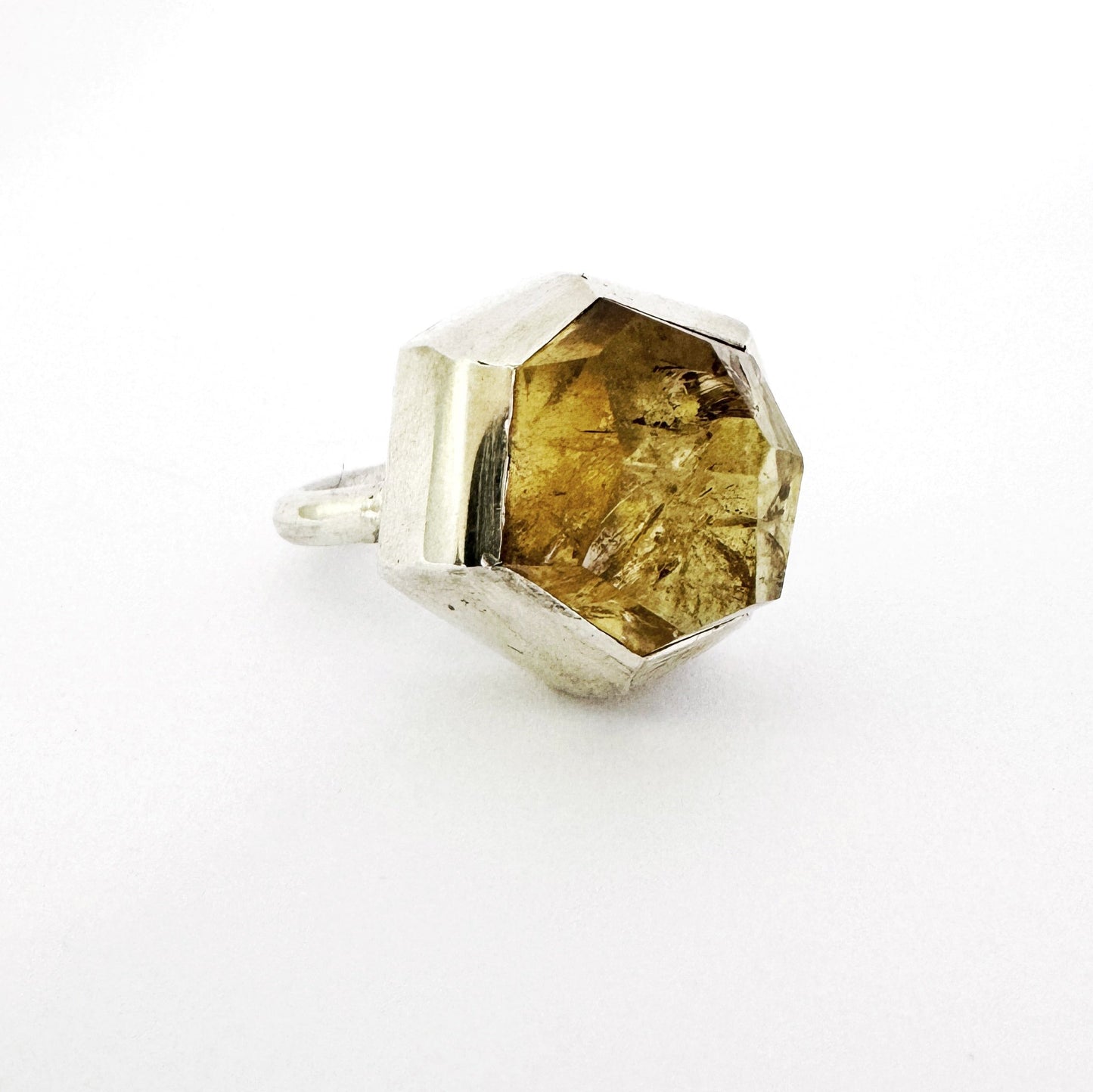 Angular faceted citrine set in sterling silver creating a unique cocktail ring that will make a statement by Savage Jewellery