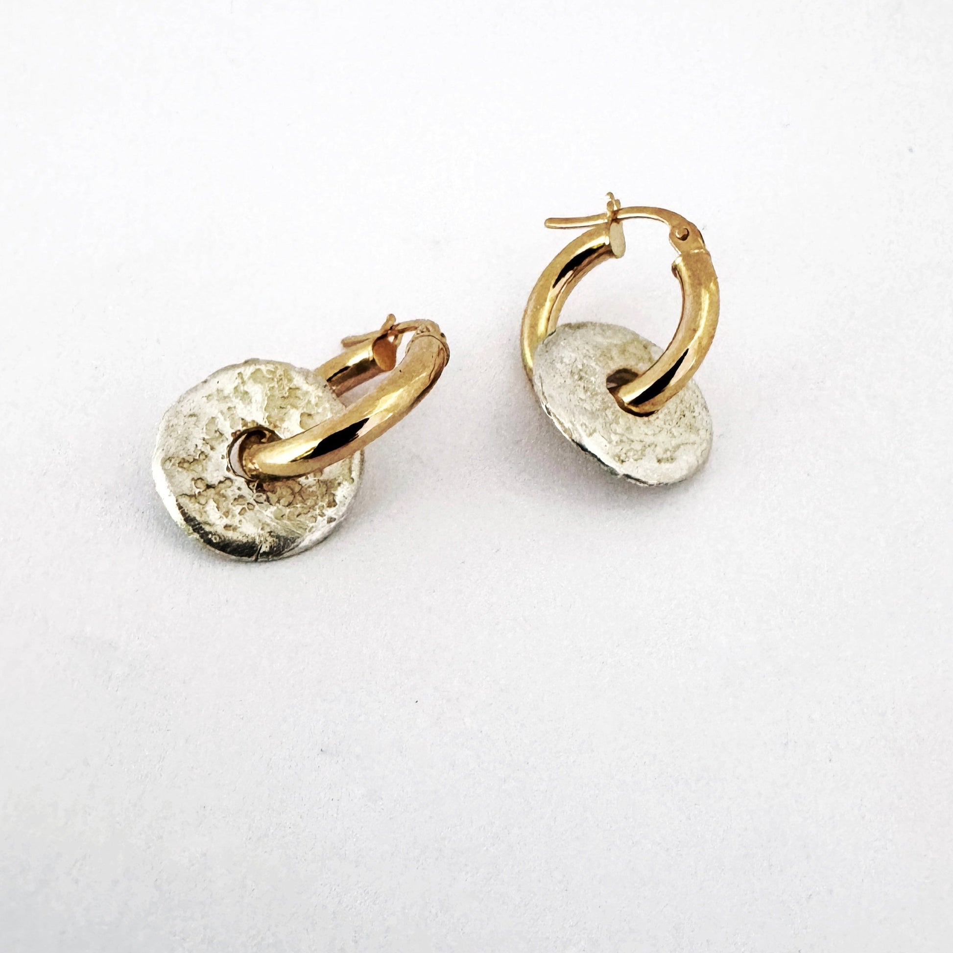 Sandcast donut element on gold hoop earring for everyday wear by Savage Jewellery