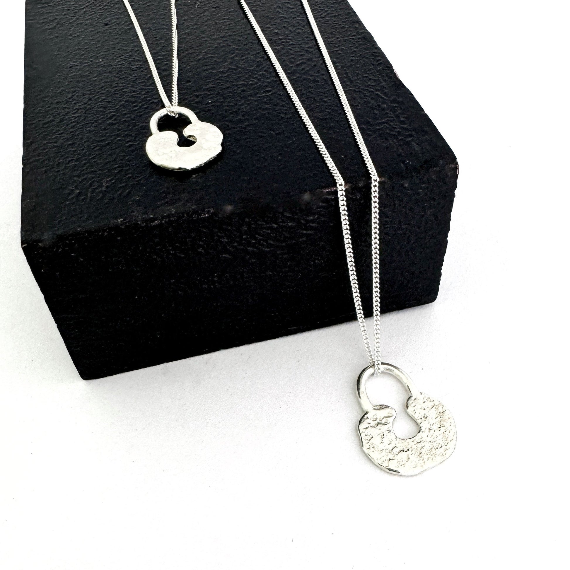 Lock pendant in medium and large sizes - uniquely different silver sandcast lock pendant on chain by Savage Jewellery