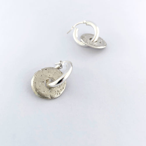 Large sand cast donut on hoop earrings by designer Savage Jewellery