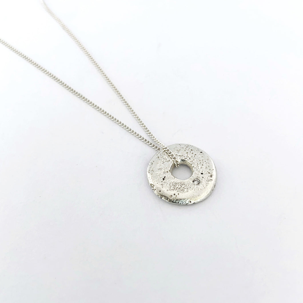 Textured donut pendant with diamond on chain by designer Savage Jewellery