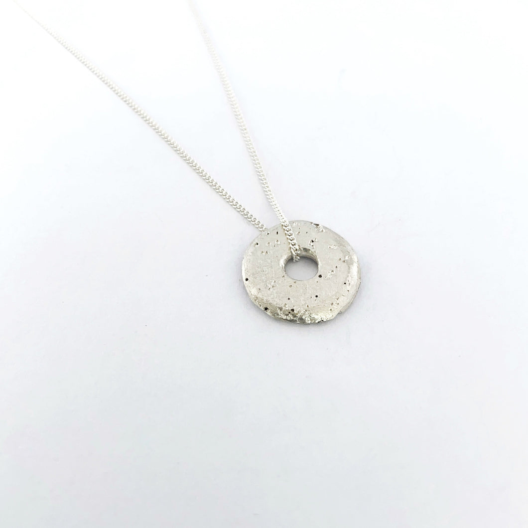 Simple modern textured sand cast pendant on chain by Savage Jewellery