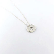 Silver beach sandcast donut pendant on chain by Savage Jewellery
