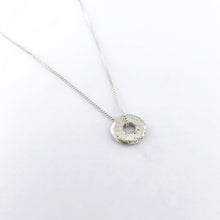 small textured sand cast donut pendant on chain by Savage Jewellery