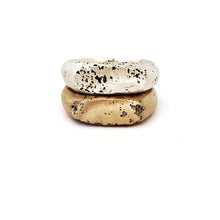 Beautifully textured silver and bronze signet ring stack