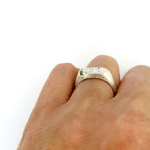 textured silver signet ring with diamond