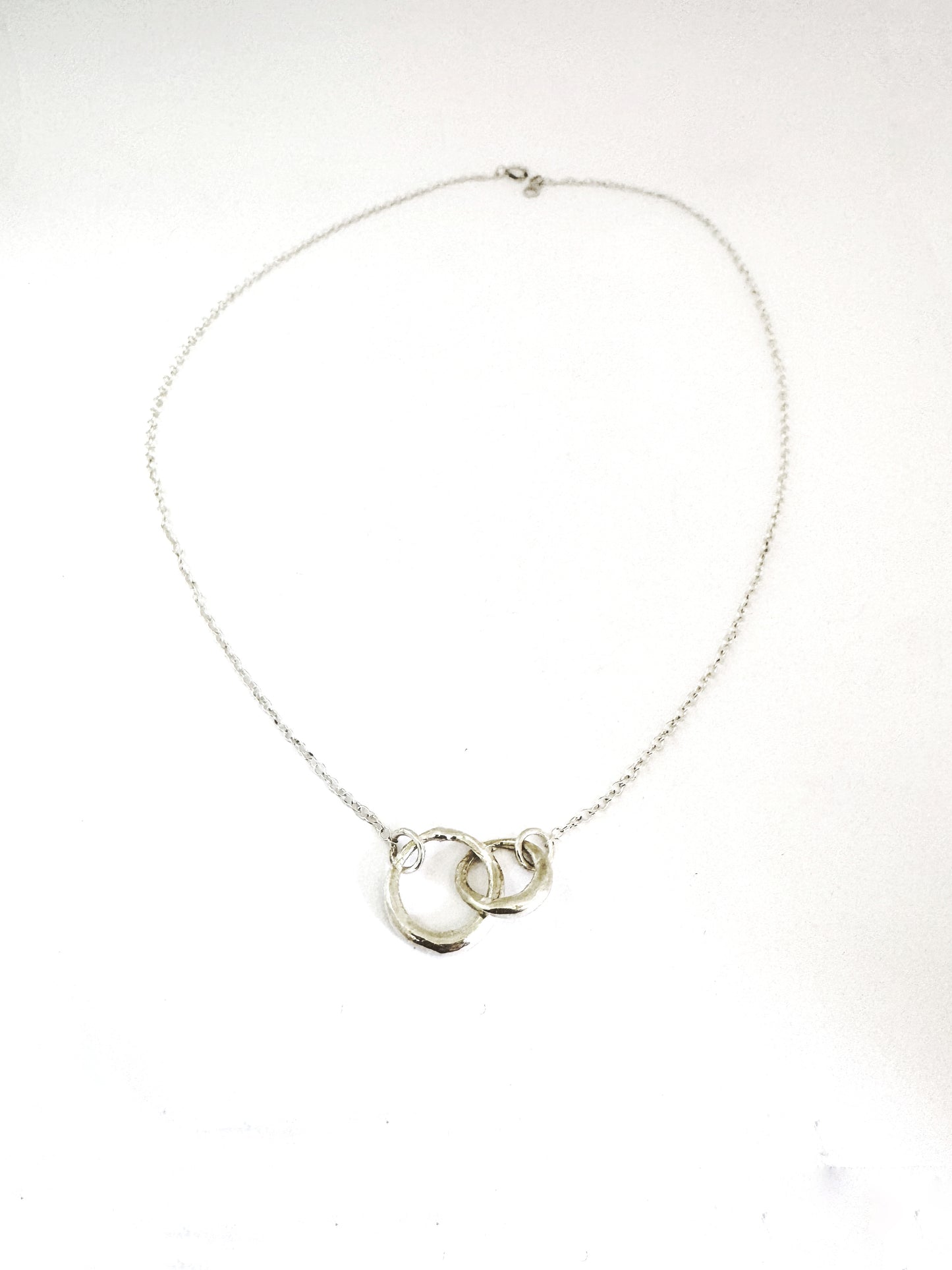 Double interlinked circle necklace in silver