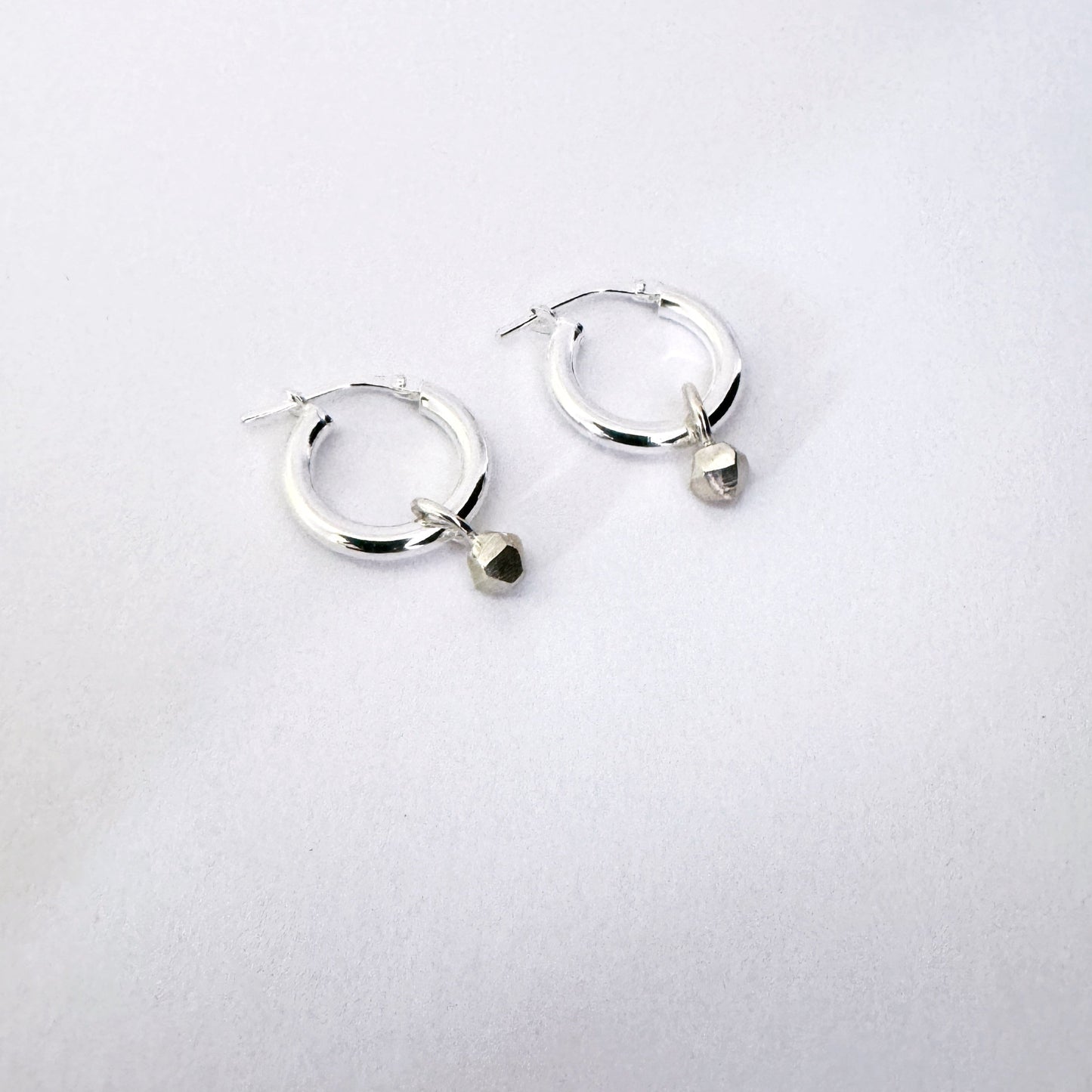 hoop earrings with tiny nugget charm - modern earrings for everyday wear by Savage Jewellery