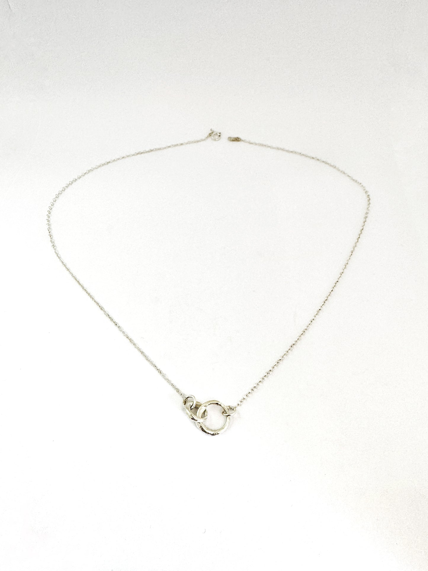 Double interlinked circle necklace in silver