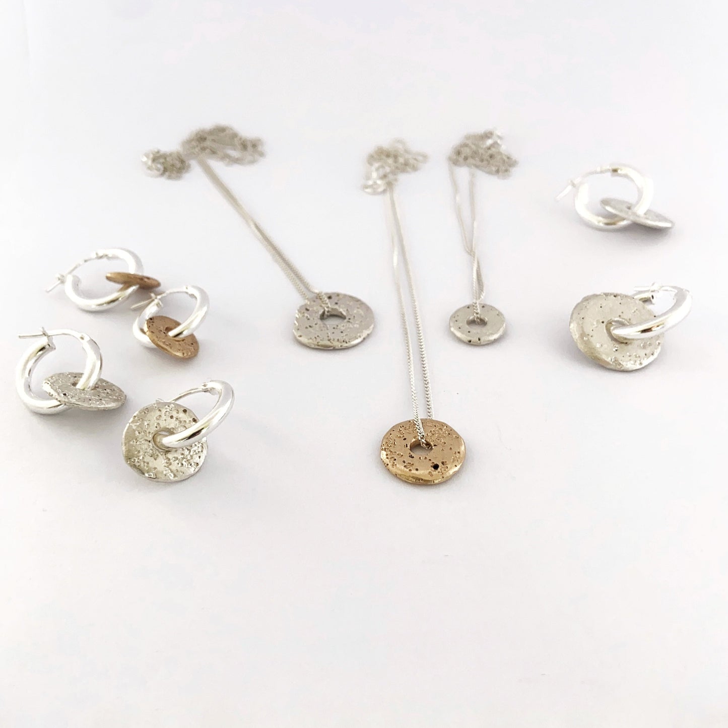 Collection of sand cast jewellery by Durban designer Savage Jewellery