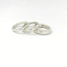 Simple solid silver stacking rings in 3mm, 4mm and 5mm widths, by Savage Jewllery