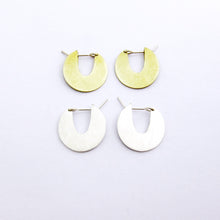 Small disk earrings in brass and silver by Savage Jewellery