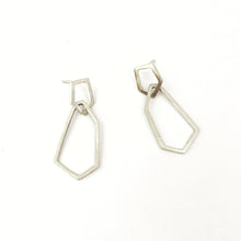 Interlinking pentagon and crystal like shapes to create a unique earring by Savage Jewellery