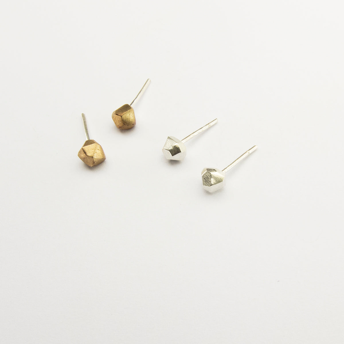 Tiny nugget studs in bronze or sterling silver designer jewelry