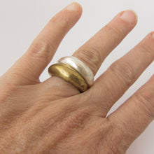 Organic tapered ring in brass and silver by Savage Jewellery
