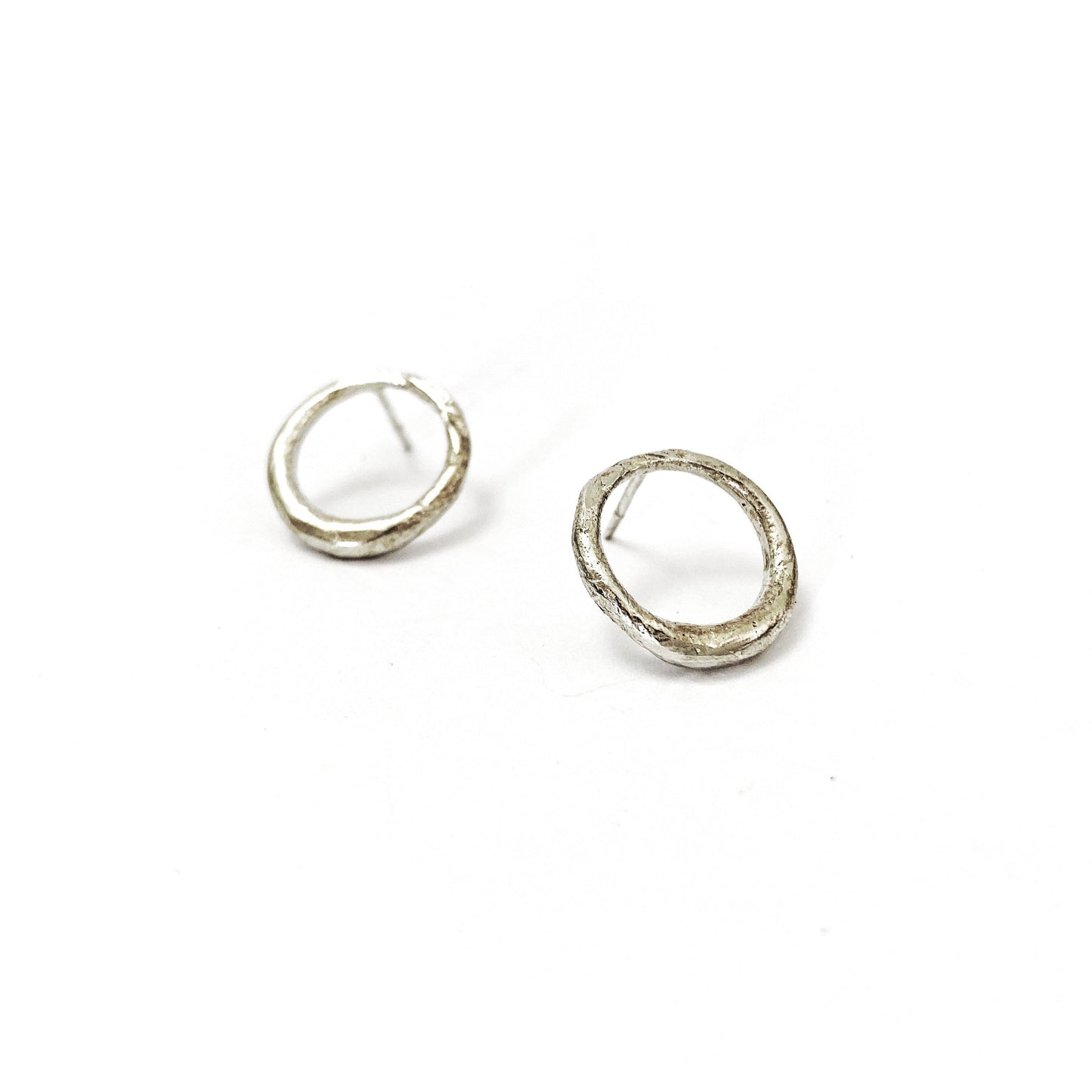 silver circle stud earrings with organic texture by designer Savage Jewellery 