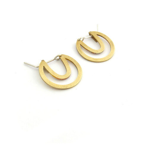 Designer disk earring, cutout in brass by Savage Jewellery made in Durban, South Africa
