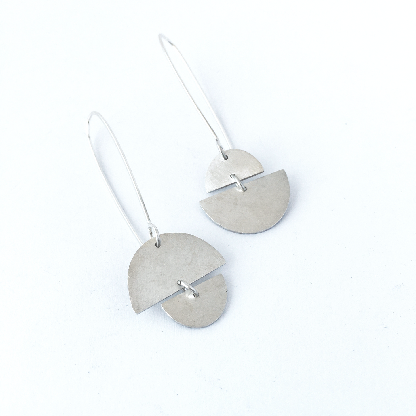 Sunrise sunset asymmetrical earrings in sterling silver by Savage Jewellery