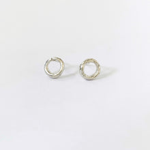 Minimalist circle studs fit perfectly on your ear for easy wearing by designer Savage Jewellery