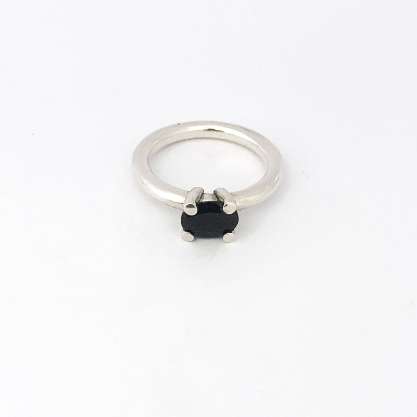 Chunky four claw ring with black spinel by Savage Jewellery