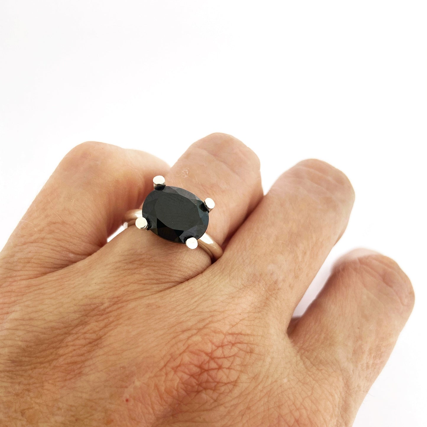 bold and simple black spinel, four claw statement ring by Savage Jewellery