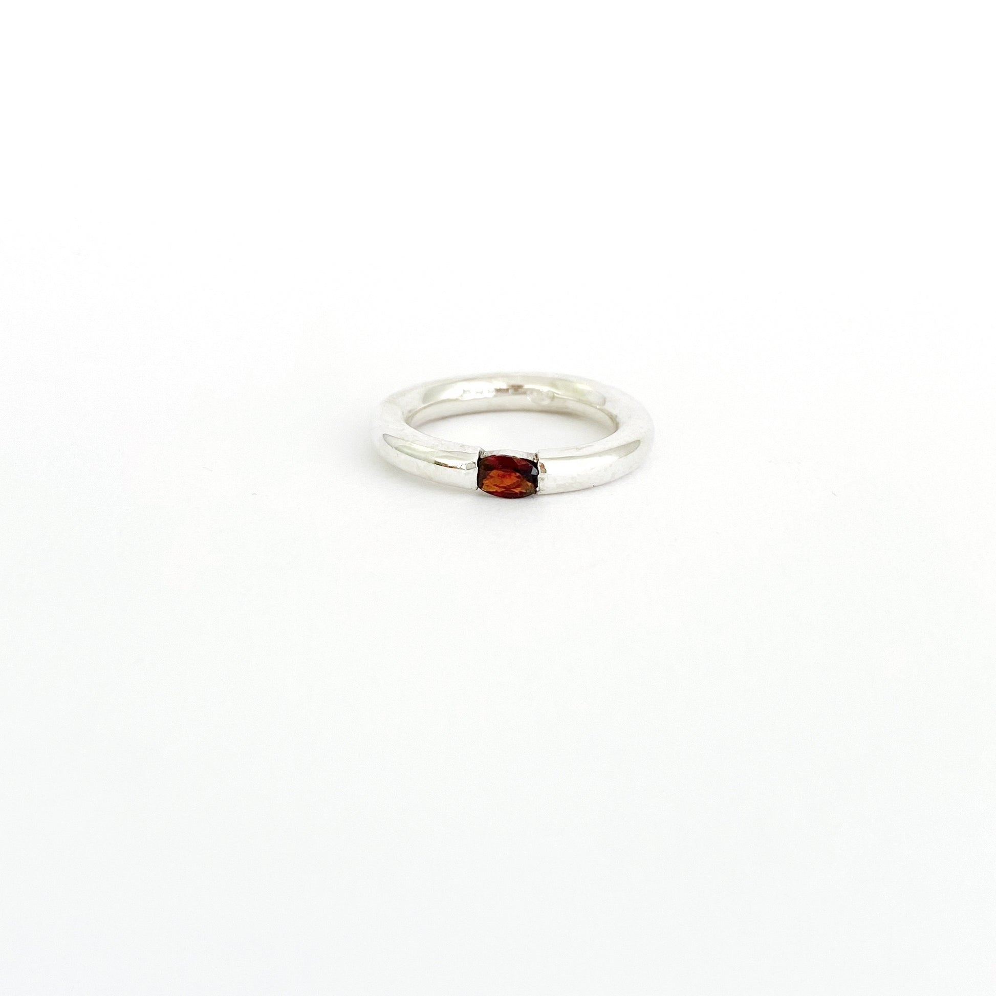 Simple garnet ring to be worn alone or stacked by Savage Jewellery - modern and unique