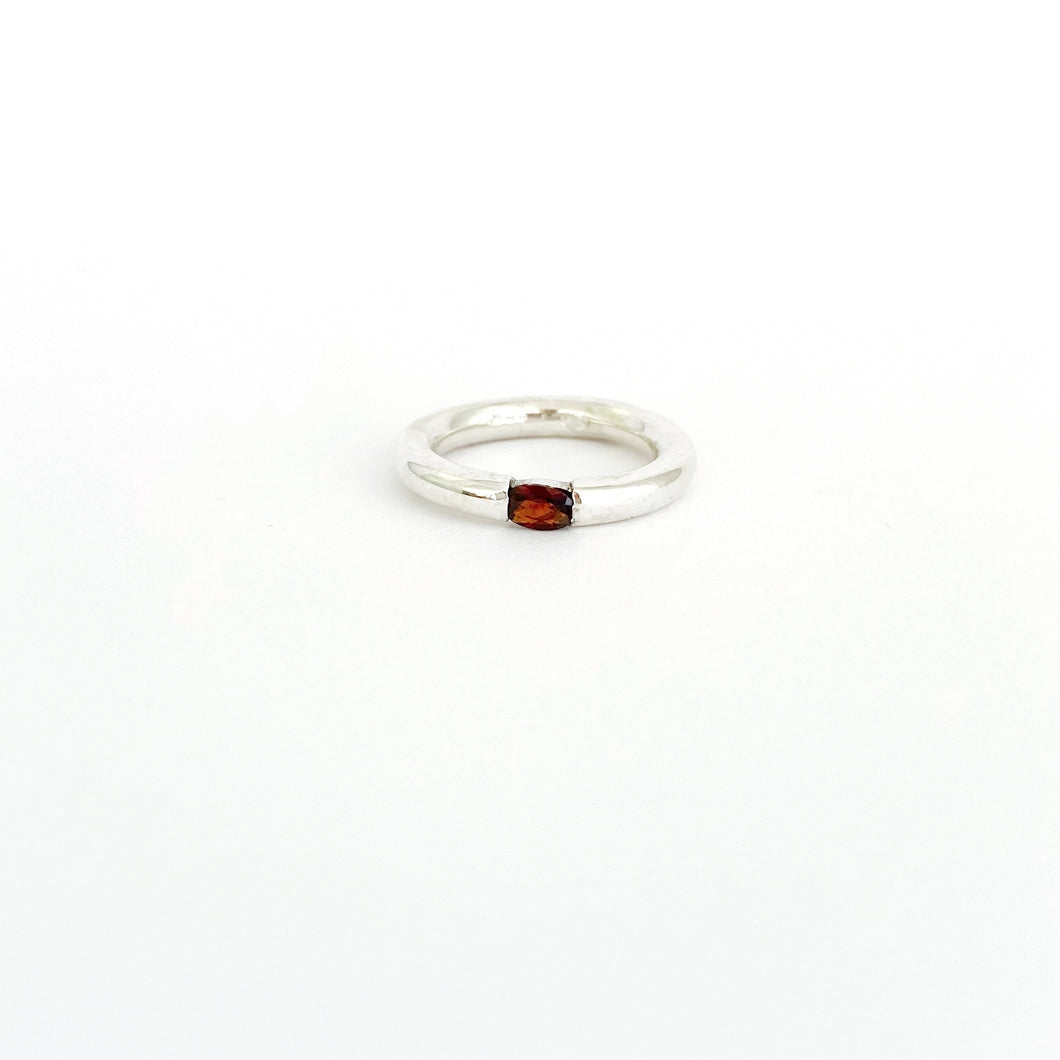 Simple garnet ring to be worn alone or stacked by Savage Jewellery - modern and unique